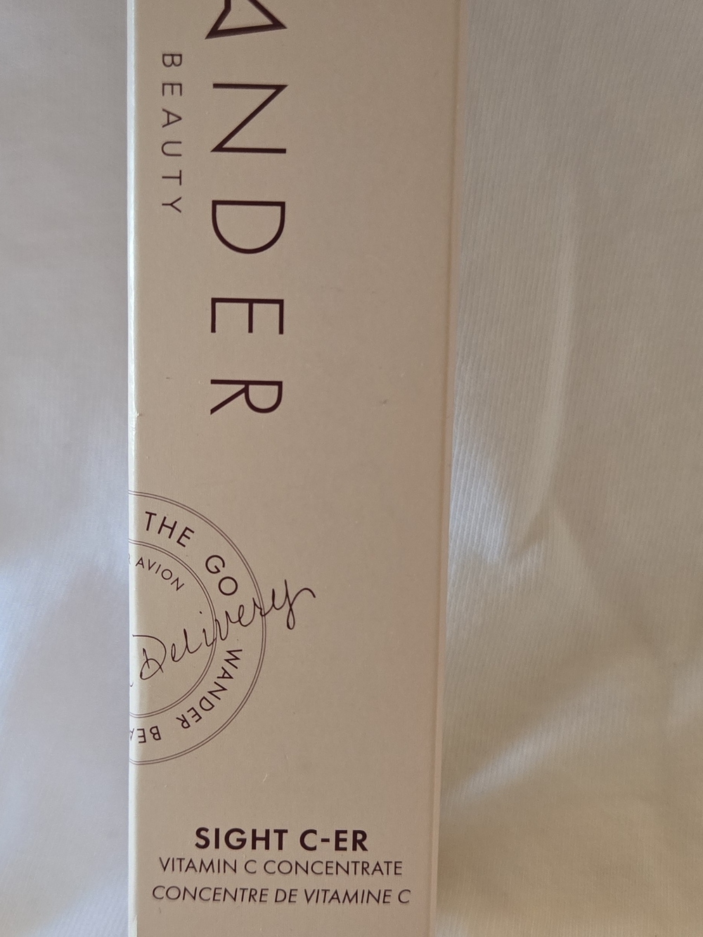 Wander Vitamin C Skincare Box in Cream and Purple Text